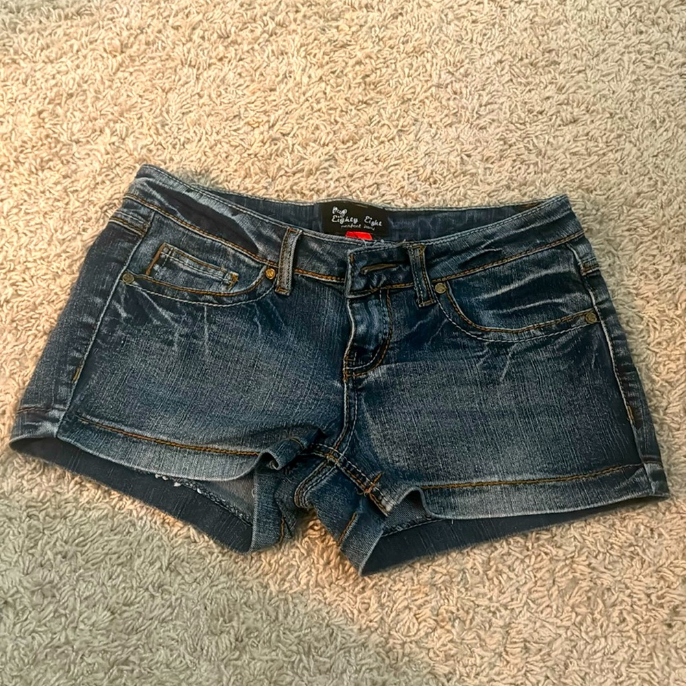 "Short, Sweet, and Stylish: Denim Delights"  size 5 denim shorts ! Barely used .